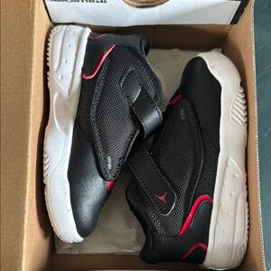 Light use Jordan Black and Red Sneakers with High-Top Design and Velcro Strap